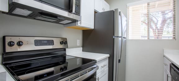 kitchen in Tucson with stainless steel energy appliances at The Vintage Apartments, Tucson, AZ