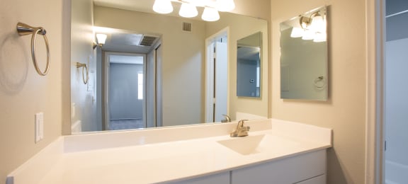 Bathroom With Vanity Lights at The Vintage Apartments, Tucson, AZ