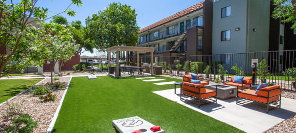 Cornhole and Seating Area at Sky Island Apartments in Sierra Vista Arizona