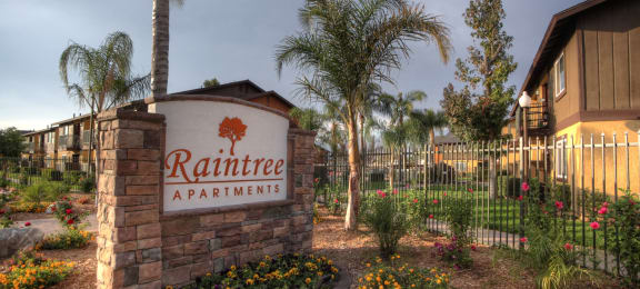 Welcoming Property Signage at Raintree Apartments, Highland, CA 92346
