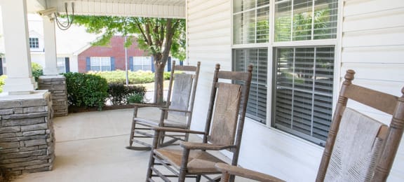 rocking chairs on front porch of clubhouse