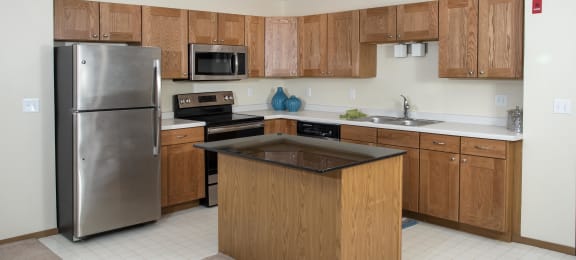 Spacious kitchens with stainless steel appliances and tons of cabinet space.