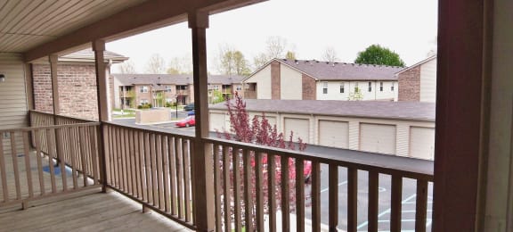a view from a balcony with a wooden deck at Canterbury house apartments
