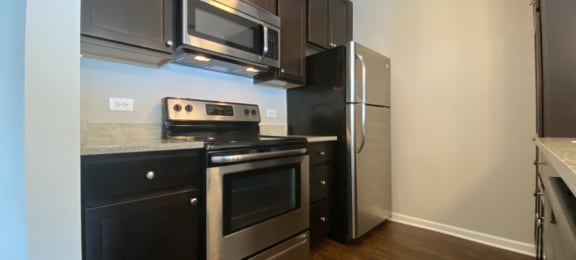 Stainless steel appliances with a built in microwave