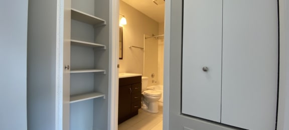 Conveniently located bathroom with linen closet