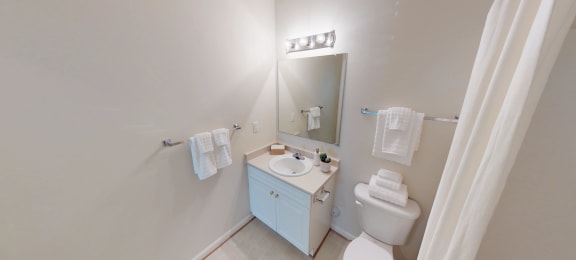 Bathroom with sink, toilet, shower and tub