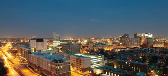 Belmont at Freemason apartments in downtown Norfolk; nighttime view overlooking the city lights