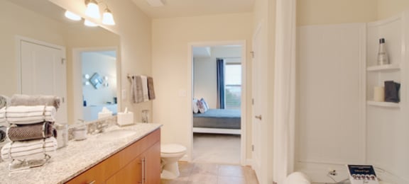 Upgraded master bathroom with granite countertops; garden tub with tile; off master bedroom