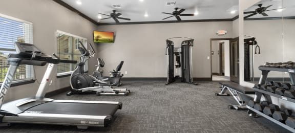 the gym with treadmills and other exercise equipment at the enclave at woodbury