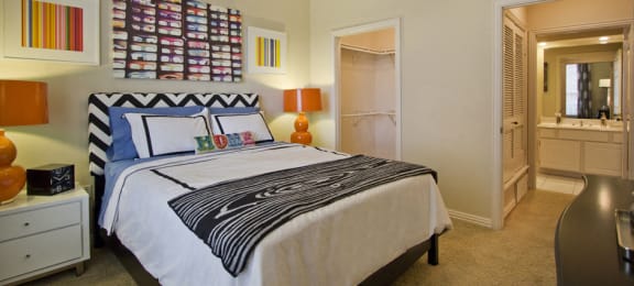 Spacious bedroom with walk-in closet and bathroom at The Biltmore Apartments in Omaha, Nebraska