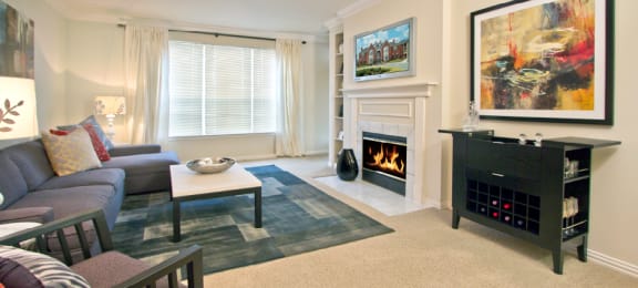 Luxury apartments with spacious layout, spacious floor plan, woodburning fireplace, oversized windows, and built-in shelves at The Biltmore Apartments in Omaha, Nebraska