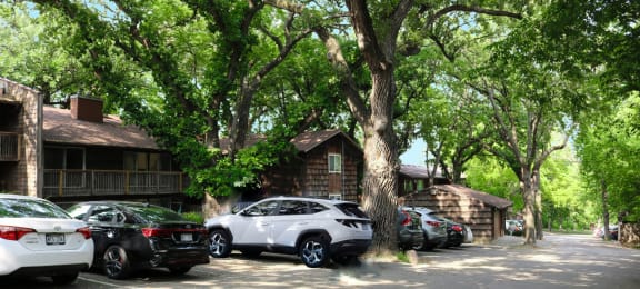 car outdoors tree apartment