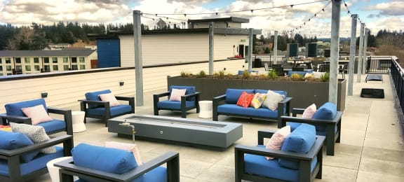 Rooftop deck includes outdoor kitchen and firepit