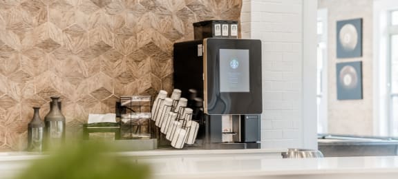 a coffee machine sitting on a counter in a room