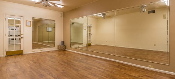 Canyon oaks spacious fitness room with ceiling fan
