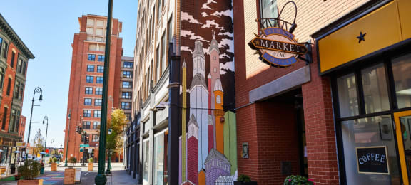 a mural on the side of a building on a city street at Ninth Square Apartments, New Haven, 06510