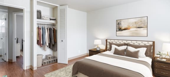 Large Bedroom with Closet and Wood Like Flooring at Georgetowne Homes Apartments, Hyde Park
