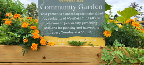 a sign for the community garden