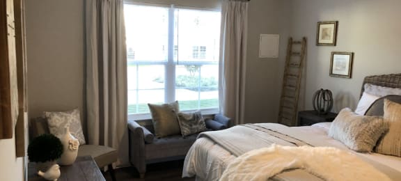 Comfortable Bedroom With Large Window  at Highland Hills Apatrtments, Grovetown, Georgia
