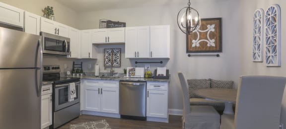 Kitchen with stainless steel appliances at Highland Hills Apartments, Grovetown Georgia