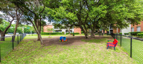 our apartments showcase a dog park with plenty of room to run and play