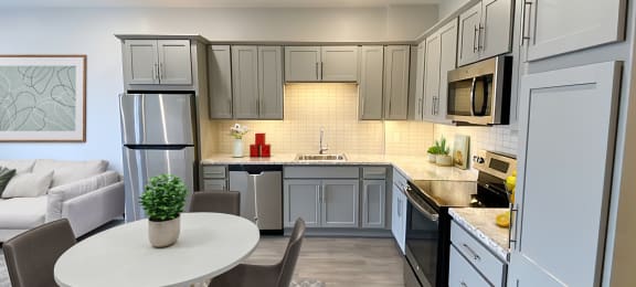 Open concept kitchen at Gateway at Belknap Apartments in Grand Rapids, MI