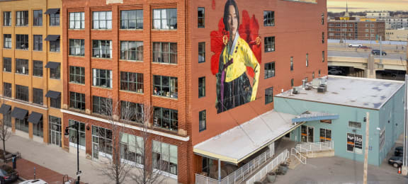 a mural of a woman on the side of a building