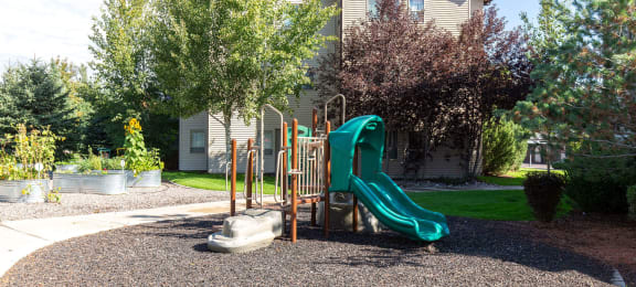 Playground with slide at Mullan Reserve Apartments in Missoula, MT