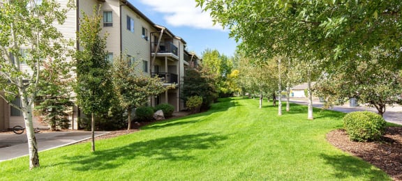 A grassy area next to the apartments at Mullan Reserve Apartments in Missoula, MT