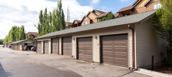 A row of brown garages at Mullan Reserve Apartments in Missoula, MT
