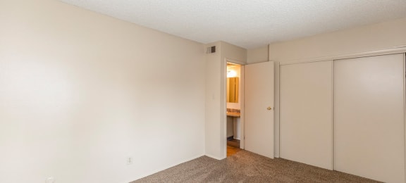 East One Bedroom Door and Closet at Raintree Apartments, Topeka, KS