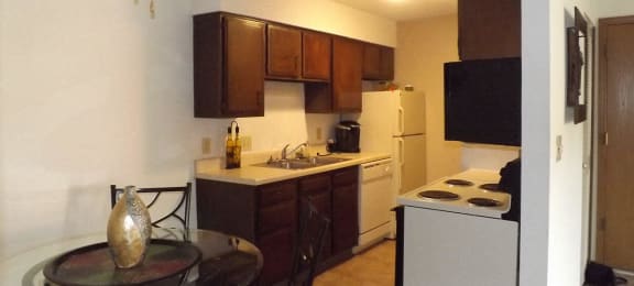 2x1 Model dining room and kitchen at Raintree Apartments, Kansas, 66614