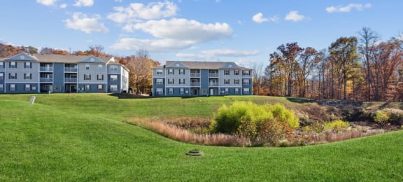 Exterior and lawn 2 at England Run Apartments in Fredericksburg VA