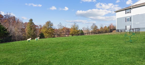 Exterior and lawn at England Run Apartments in Fredericksburg VA