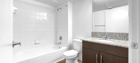 Bathroom with shower and sink at Cedar Grove Apartments in Miami Gardens FL