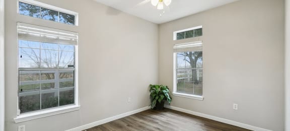 Bedroom with ceiling fan at Almeda Park Apartments in Houston TX