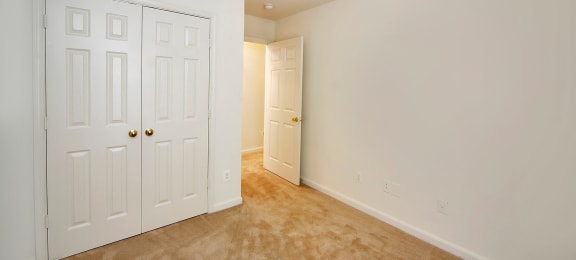 Bedroom with closet at Broadwater Townhomes in Chester, VA