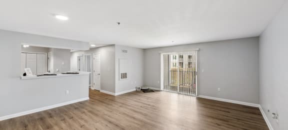 Apartment with private patio and hardwood flooring at England Run Apartments in Fredericksburg VA