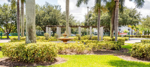 Exterior fountain at Cedar Grove Apartments in Miami Gardens FL