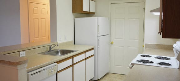 Kitchen area at Whispering Oaks Apartments in Portsmouth VA