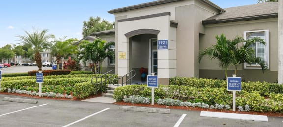 Exterior of leasing office at Brenton at Abbey Park Apartments in West Palm Beach FL