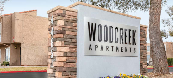 Exterior monument at Woodcreek Apartments in Las Vegas NV