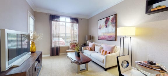 Luxury apartments with spacious living room and 10-foot ceilings at Tuscany Court Apartments in Houston.