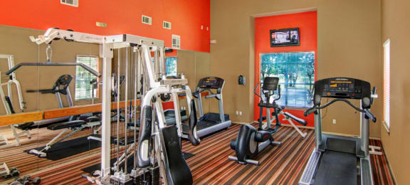 Luxury apartments with 24-hour fitness center in a gated community near the energy corridor in Houston.