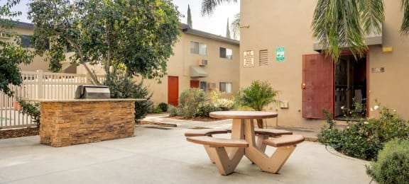 Luxury Apartments in Canoga Park for Rent - Parthenia Terrace - BBQ with Counter Space and Landscaping Around.