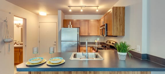 a kitchen with a blue counter top and a sink
