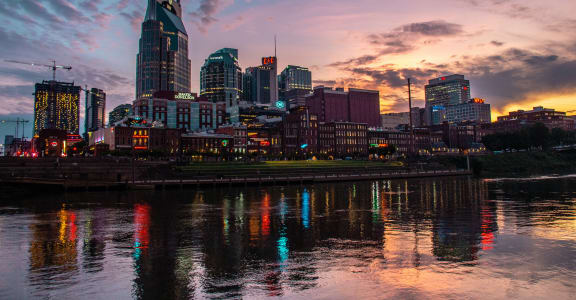 a view of the nashville skyline at sunset