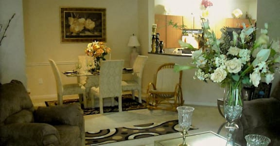 furnished model living room and dining room