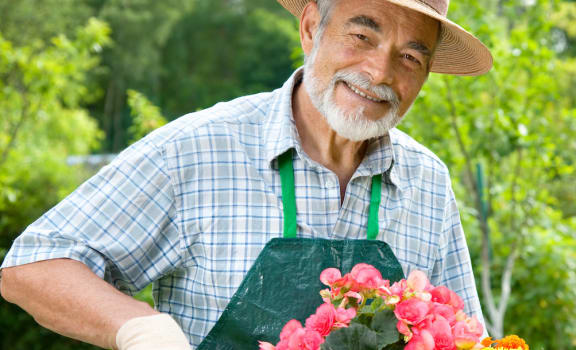 Senior Gardener enjoying life at Villa Vincente in Fort Myers