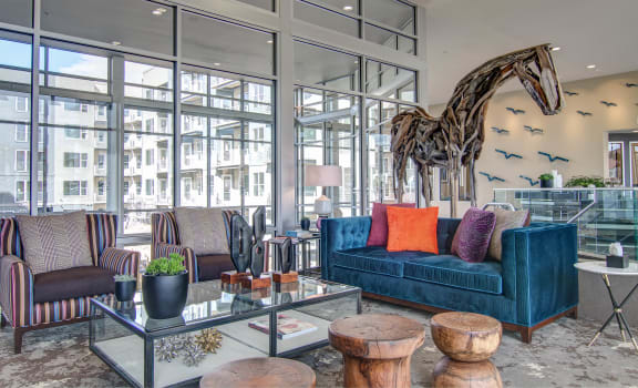Veranda Highpointe lobby with giraffe and blue couch
